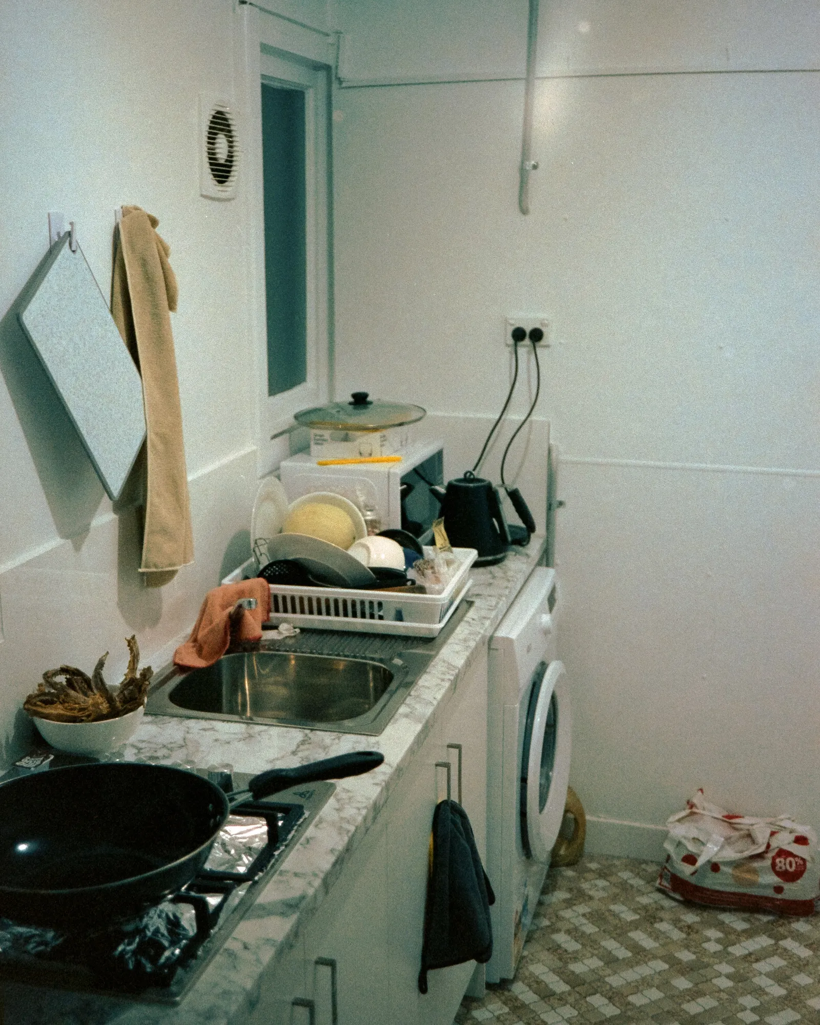 A back room, mid-afternoon.